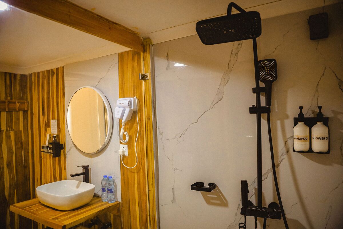 The bathrooms — Basins, mirrors, showers and WCs inside the domes.