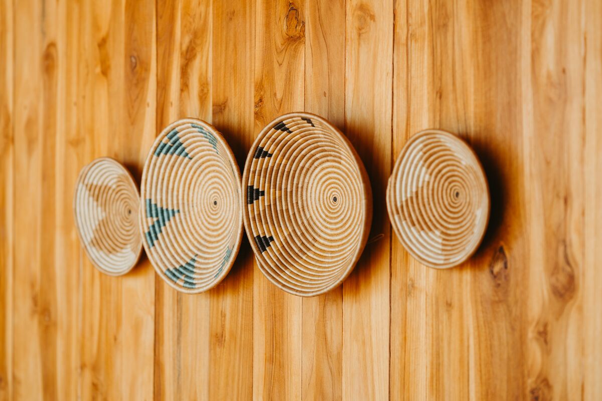 Woven baskets on the timber wall of the Honey Suite