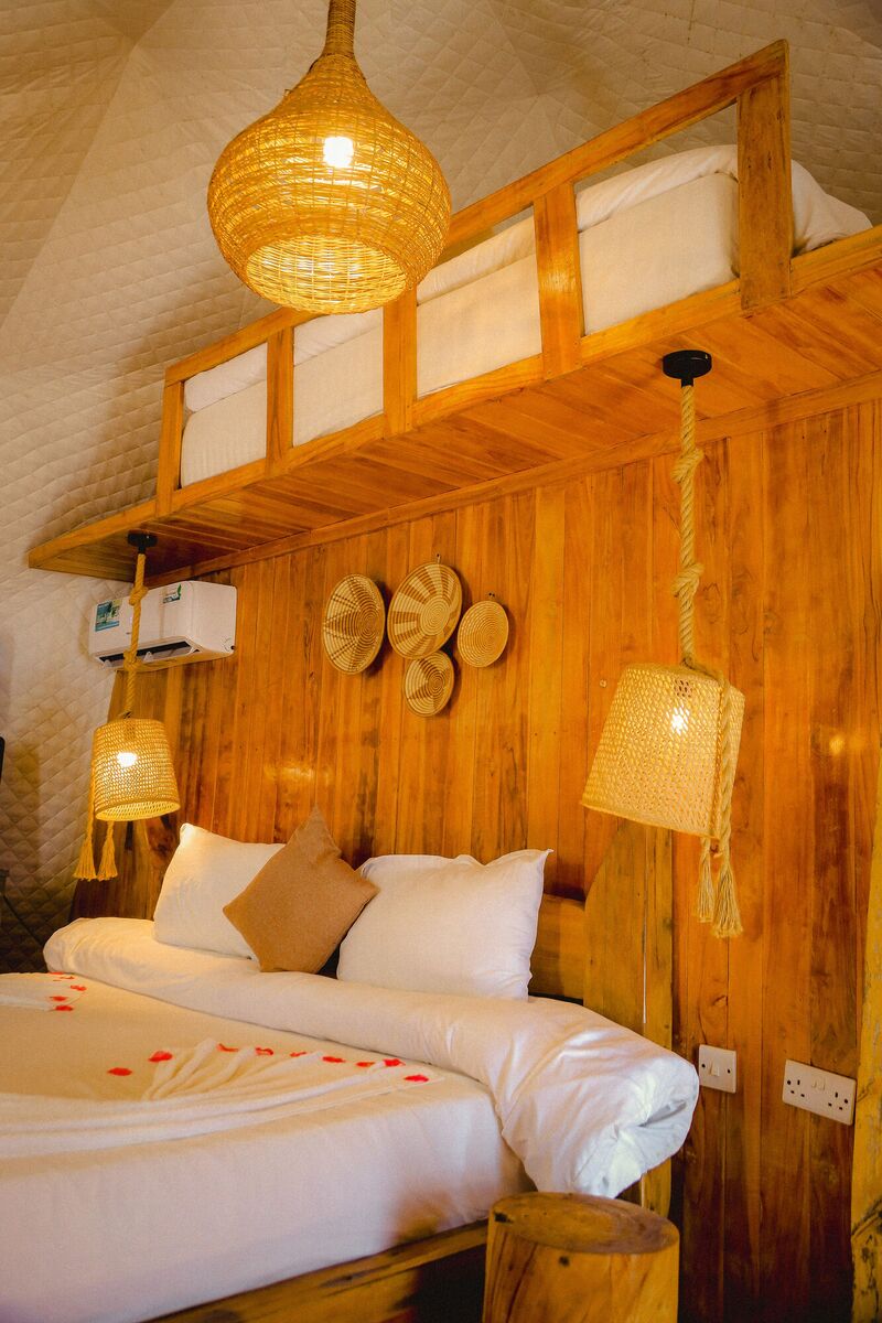 Inside the second Standard tent at Cterra Saadani, with the woven bowls and the mirror