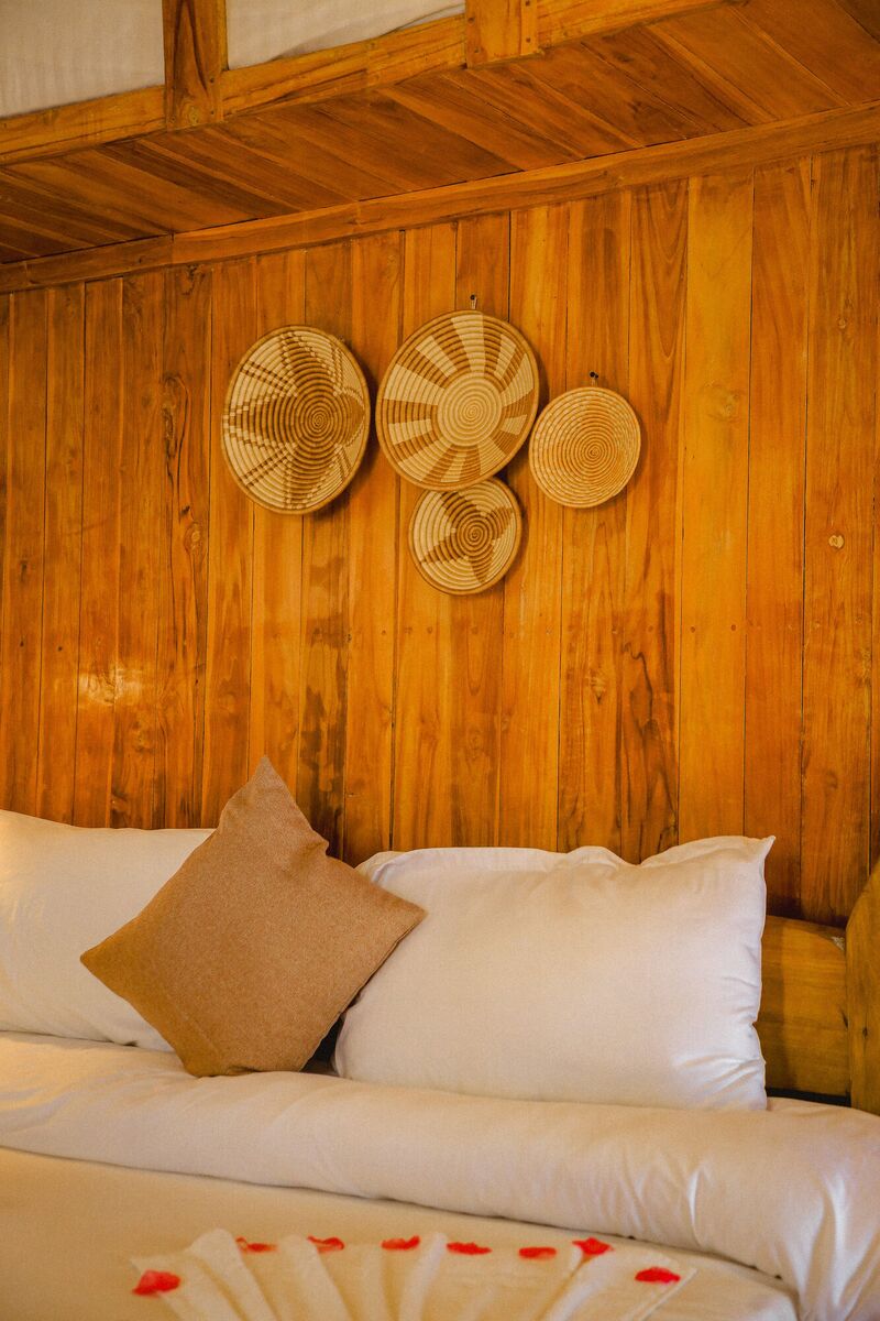 Inside the second Standard tent at Cterra Saadani, with the woven bowls and the mirror