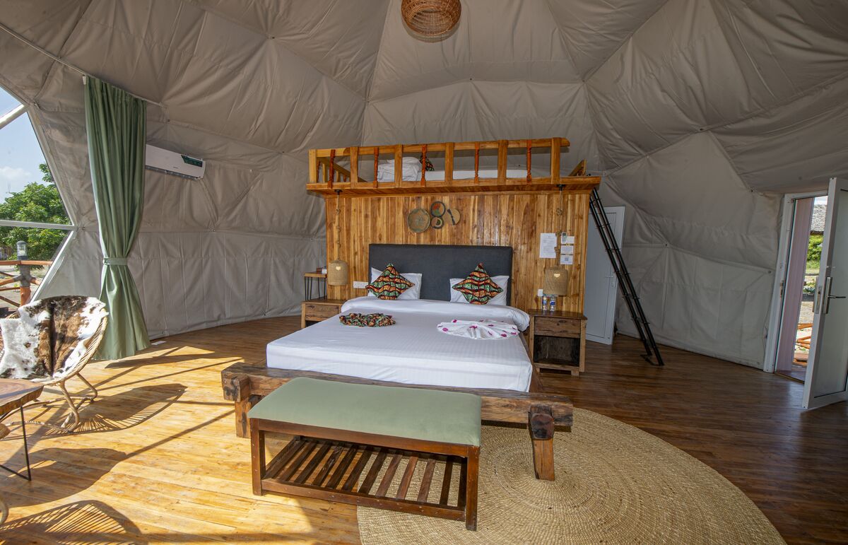The Family Sea View dome at Cterra Saadani, with the deck beyond
