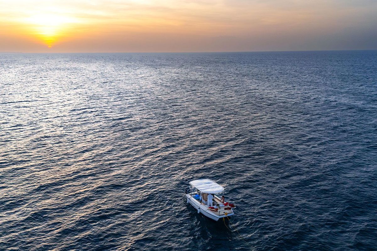 The boat alone on the open sea, seen from high above